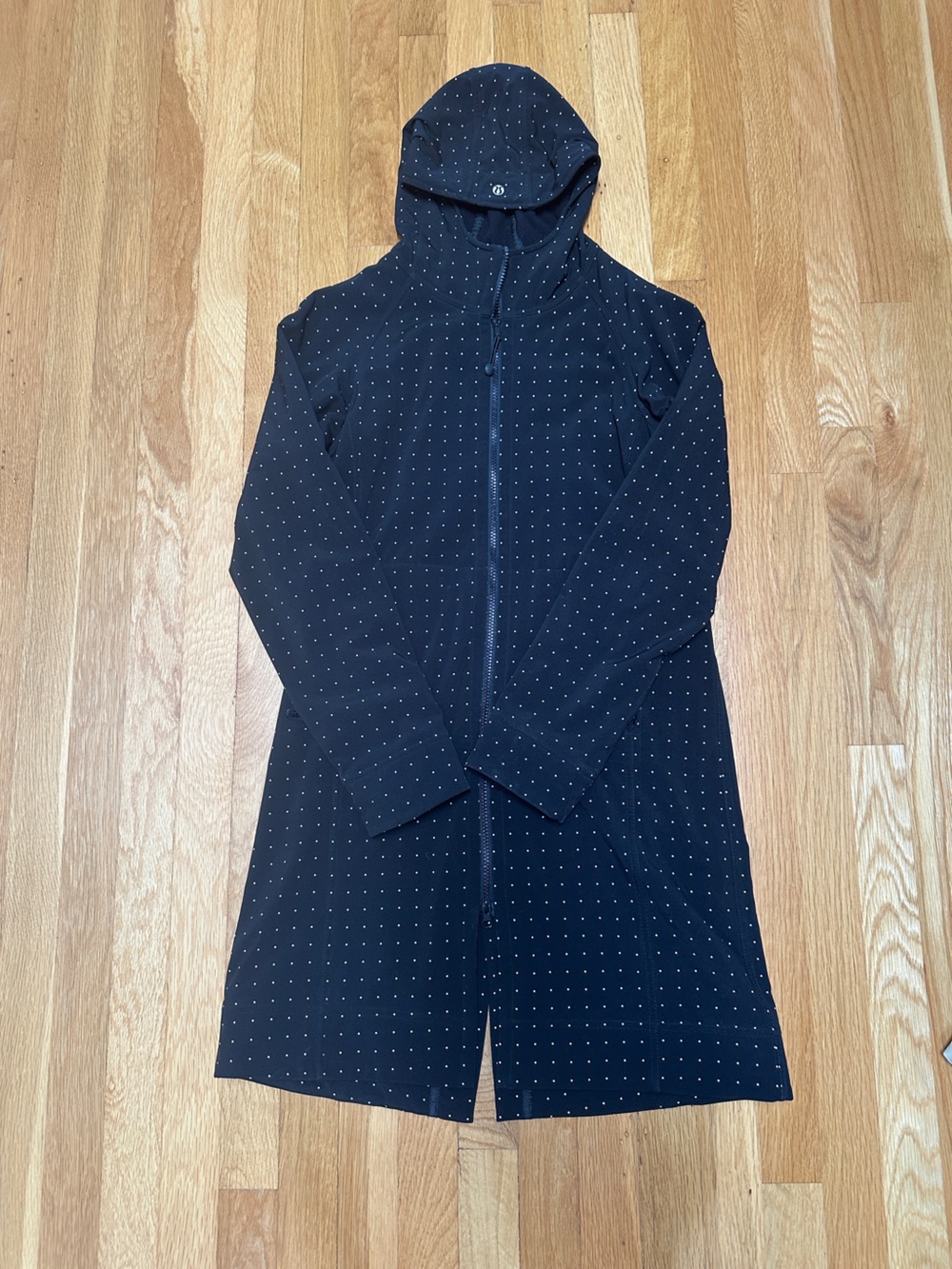 Lululemon black rain jacket with white polka dots